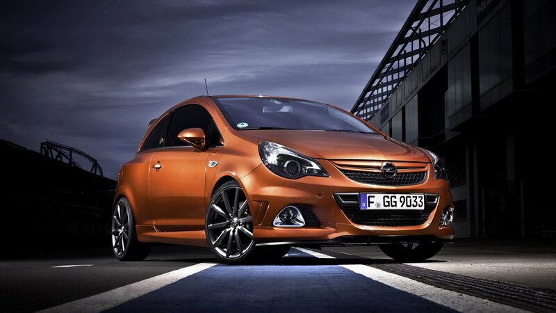 Orange Opel Corsa Car — Dramatic, Night, Photograph, Building