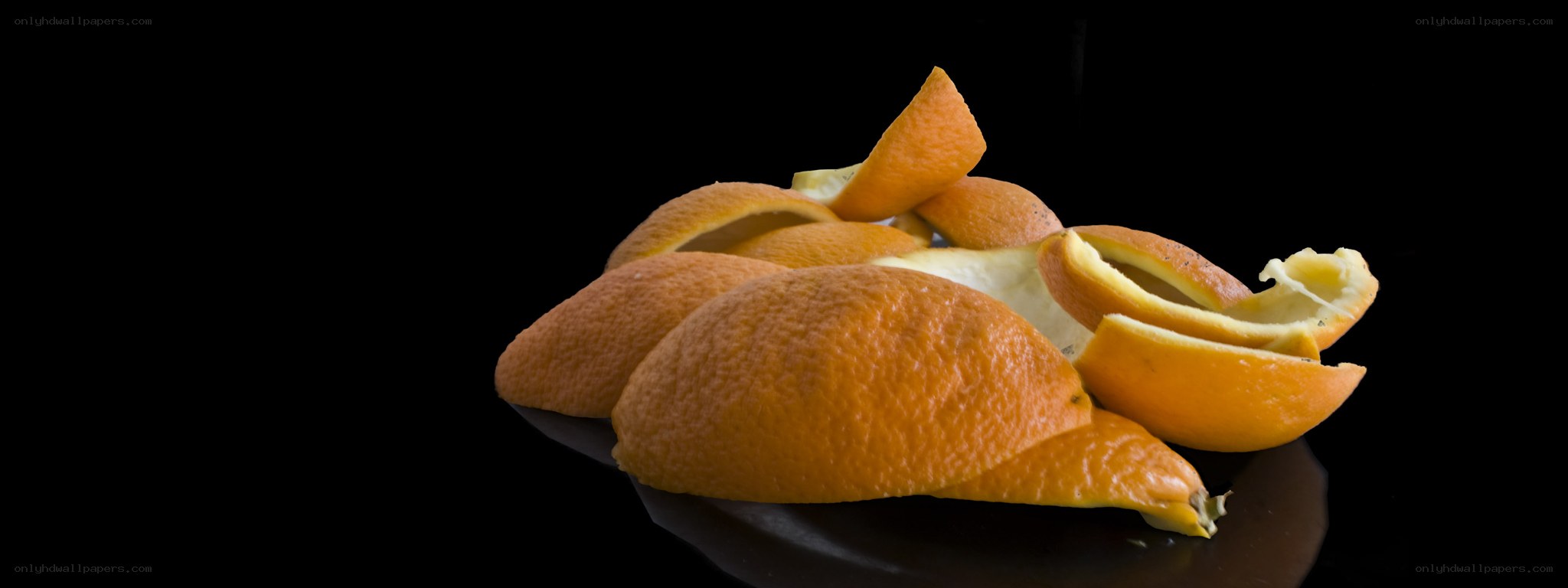 orange peels on black surface