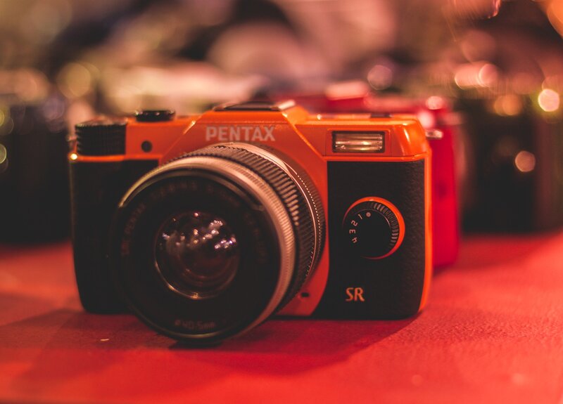 Orange Pentax Camera