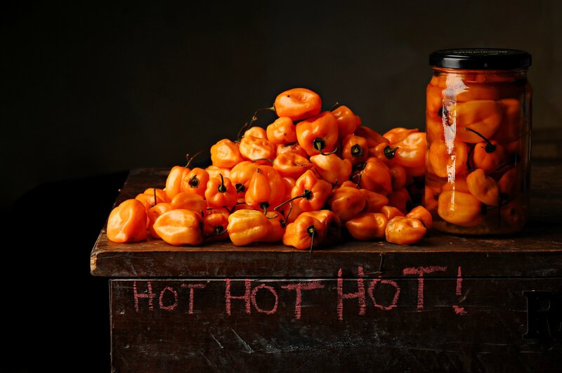 Orange Peppers on Table