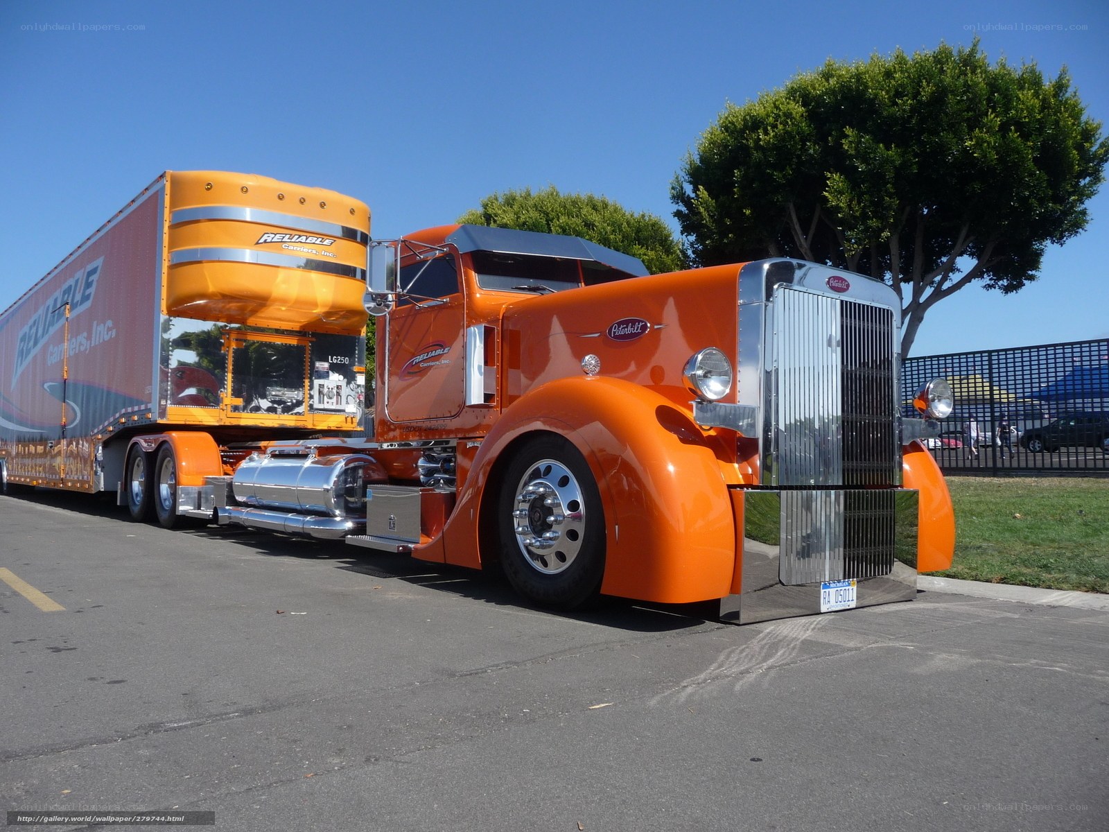 Orange Peterbilt semi-truck