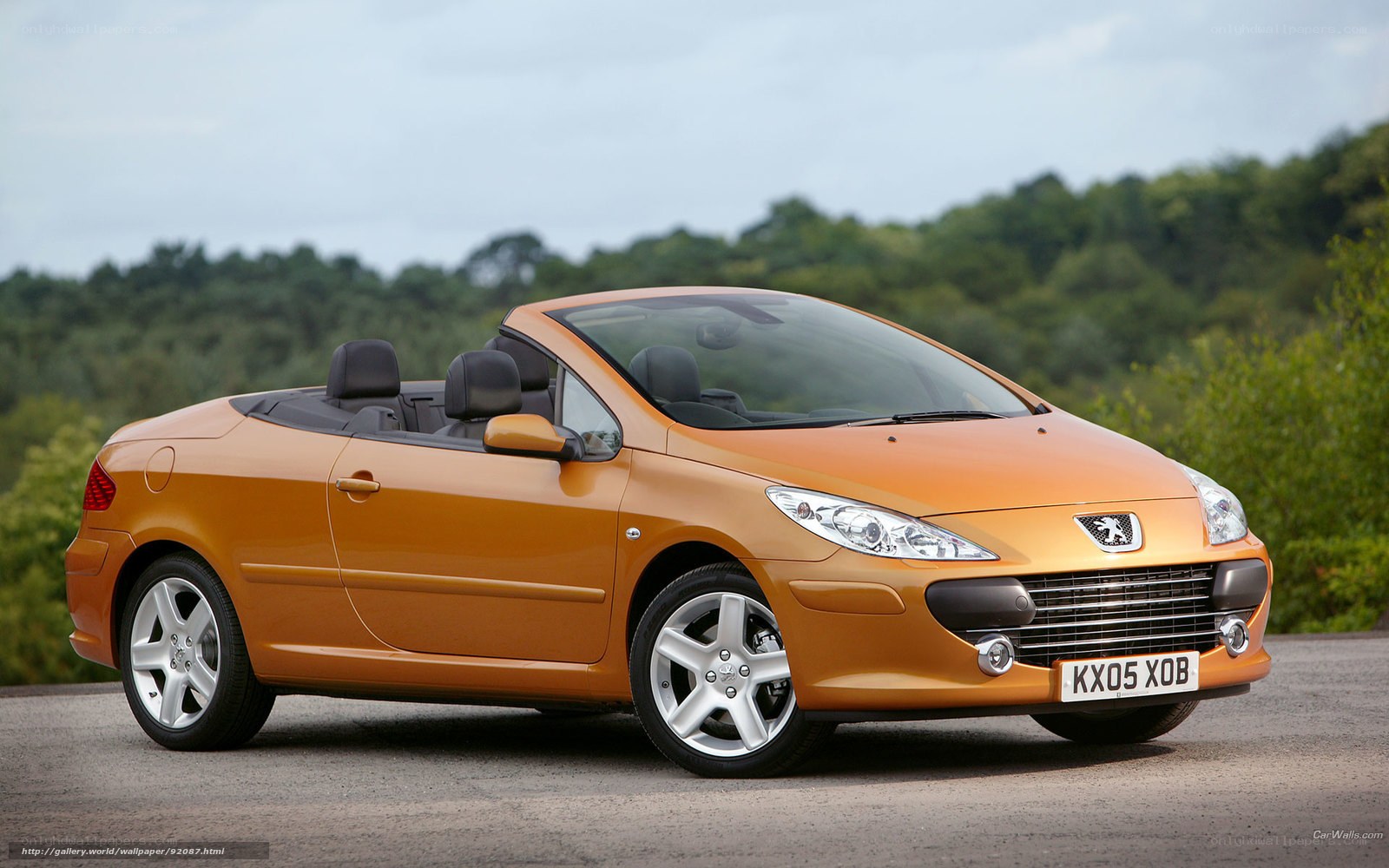 orange peugeot convertible car