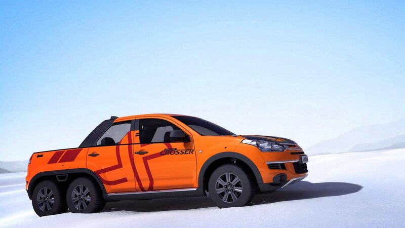 Orange pickup truck in desert