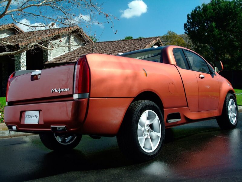Orange pickup truck on street