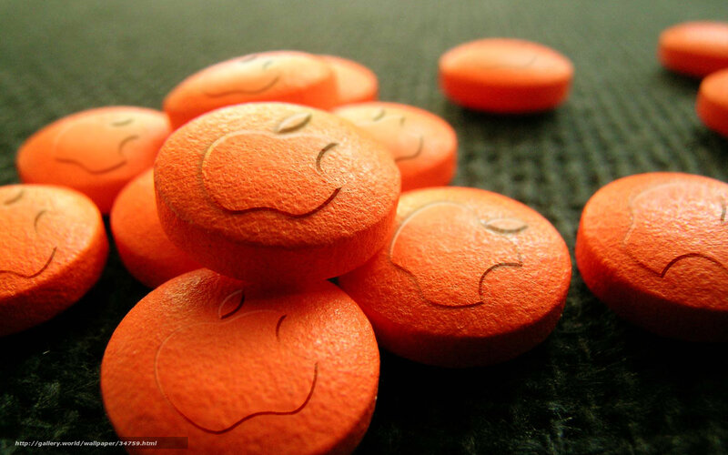 Orange pills with smiley faces