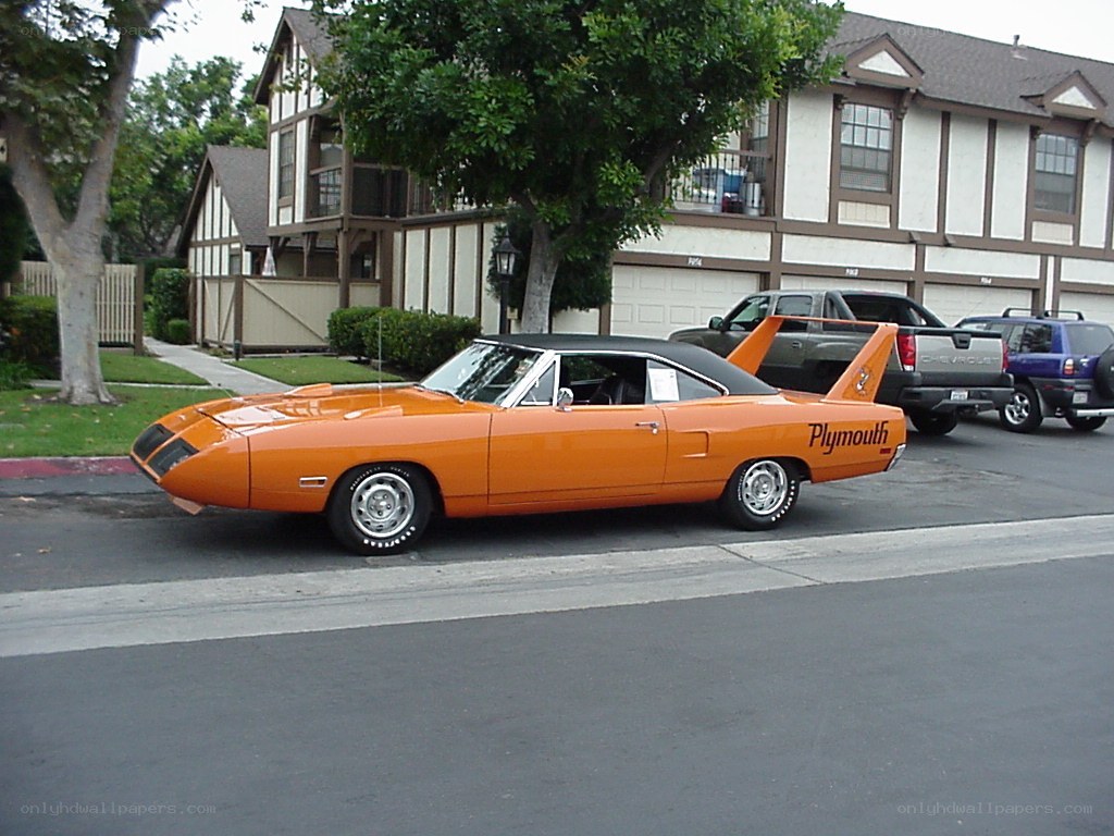 Orange Plymouth Superbird parked