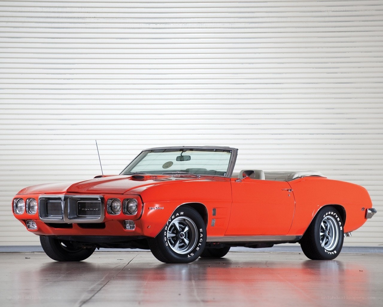 Orange Pontiac Firebird convertible