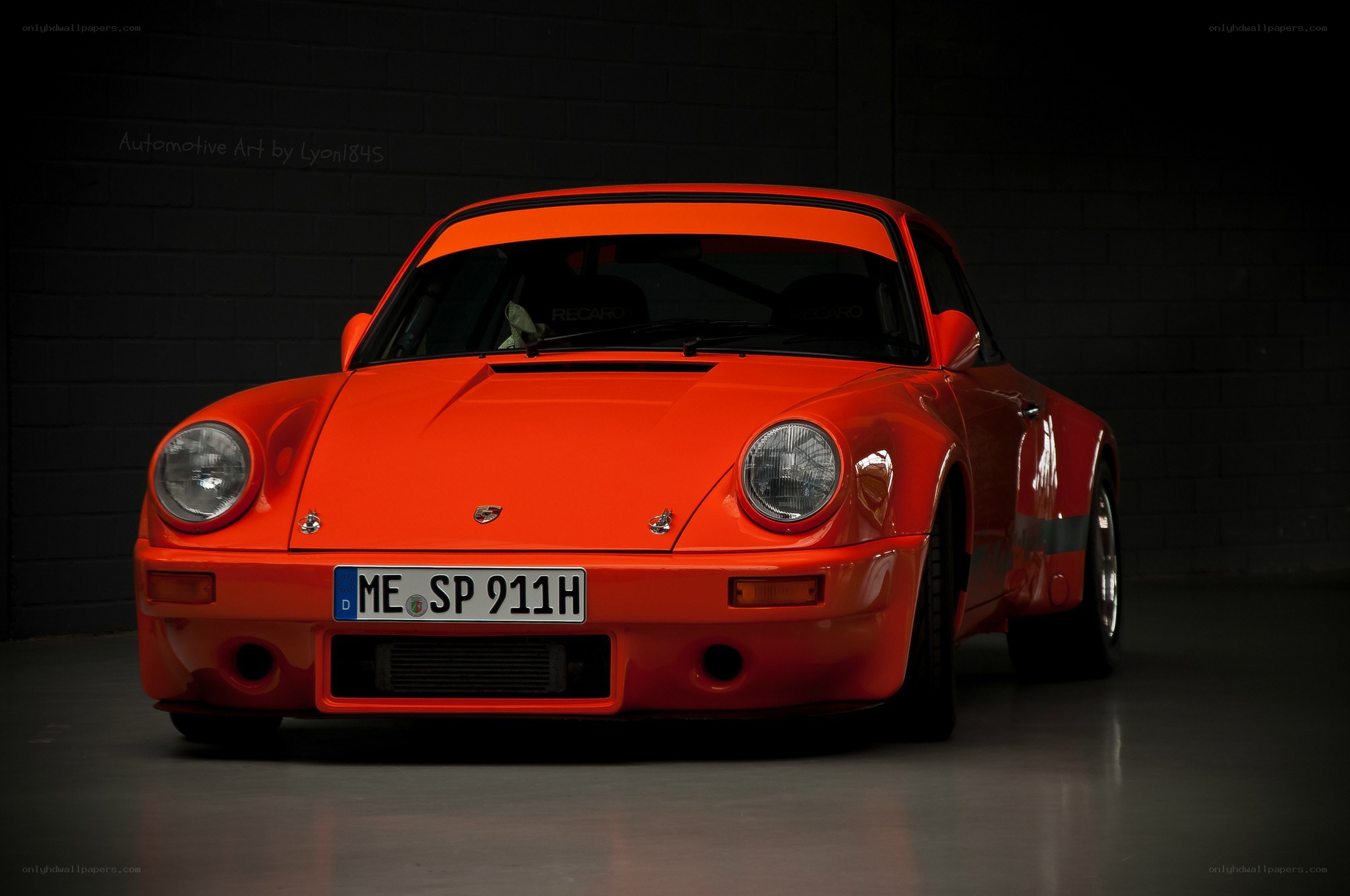 Orange Porsche 911 in studio