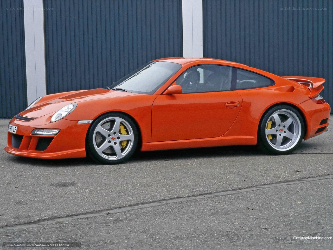 orange porsche 911 sports car
