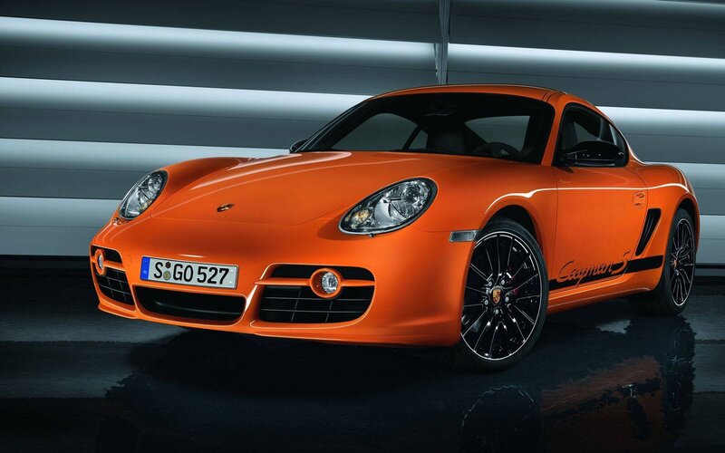 Orange Porsche Cayman S — Dramatic