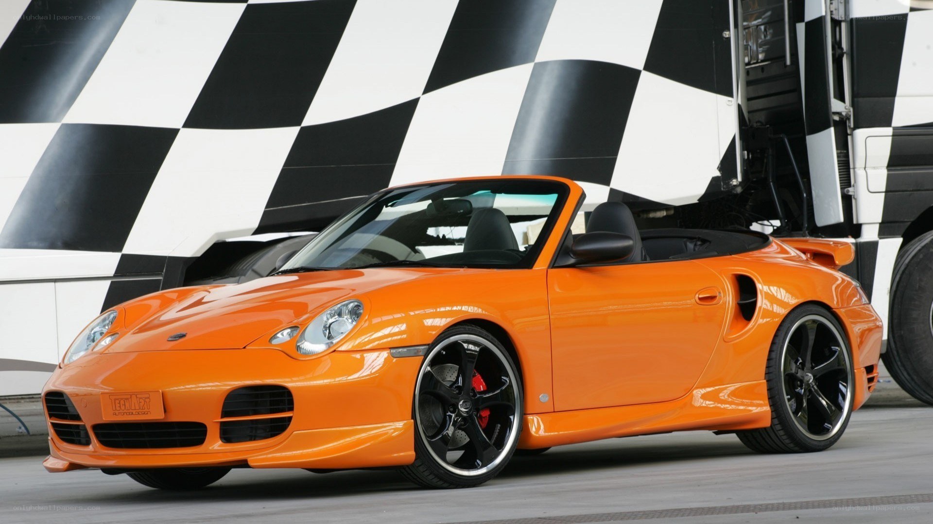 orange porsche convertible