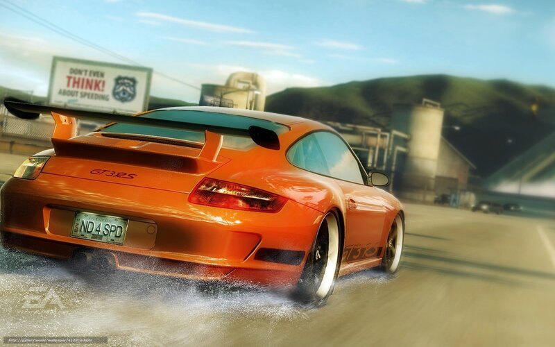 orange porsche drifting on wet road