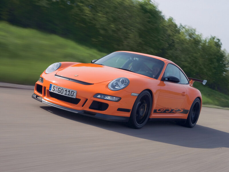 Orange Porsche GT3 RS in motion