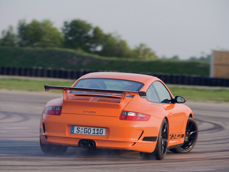 Orange Porsche GT3 RS on track