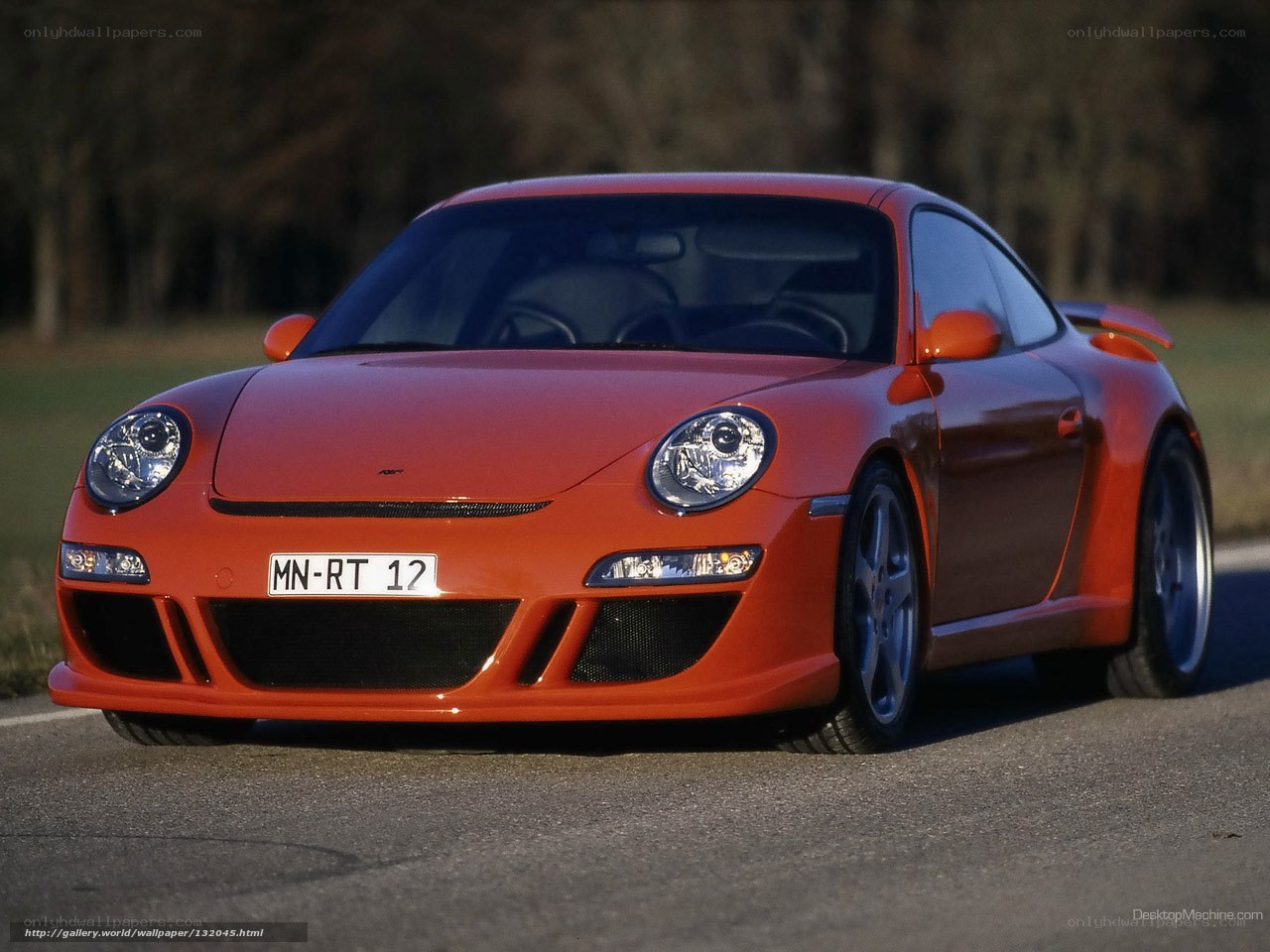 orange porsche sports car