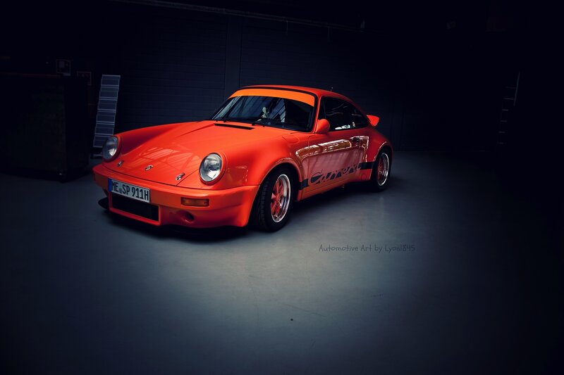 Orange Porsche Sports Car — Dramatic