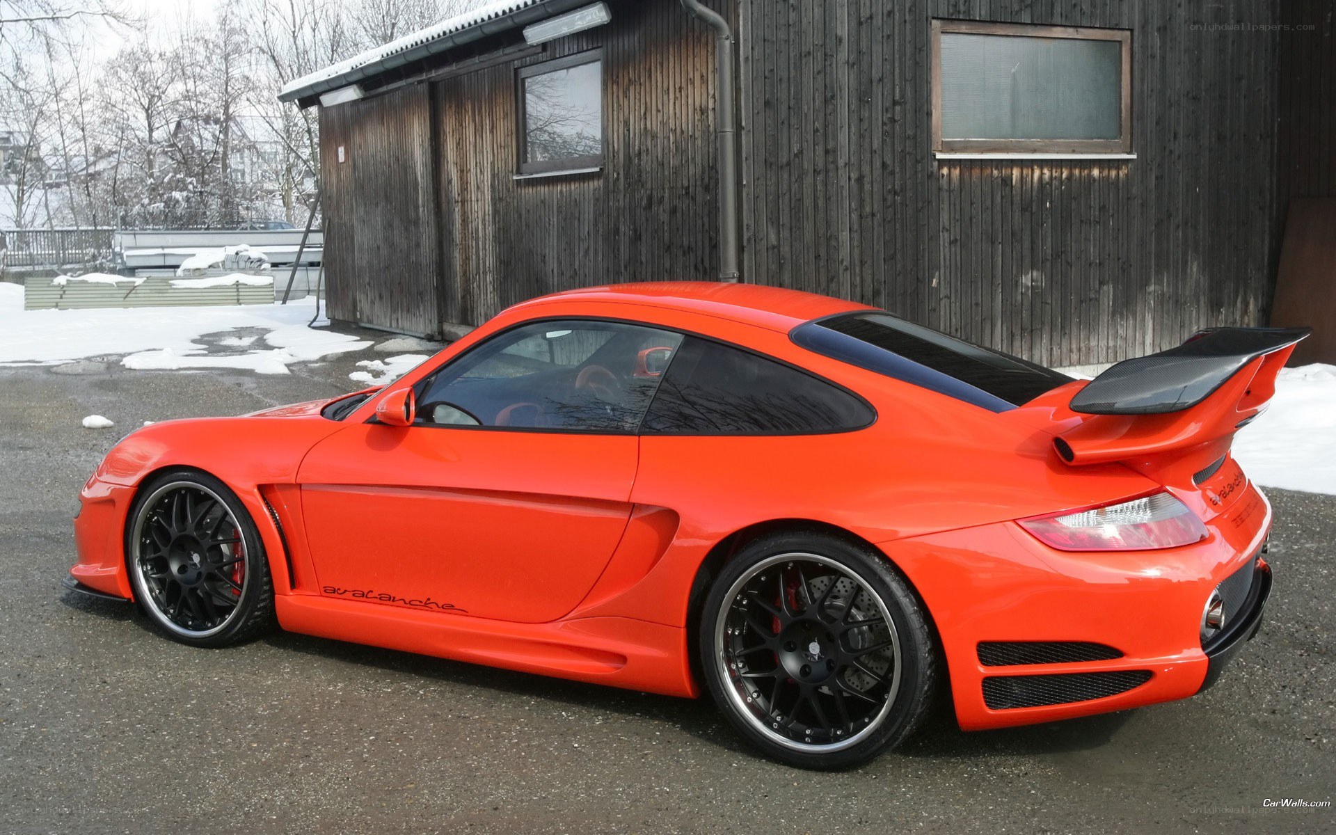 Orange Porsche with rear wing