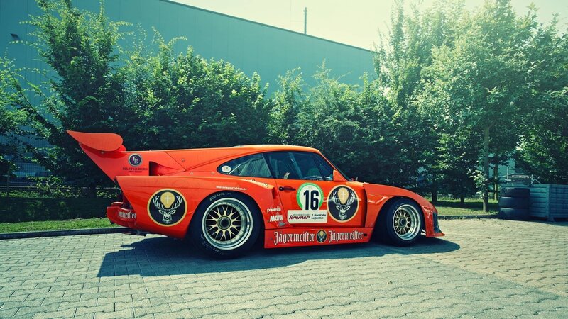 Orange Race Car — Dramatic, Afternoon, Photograph, Trees, Building