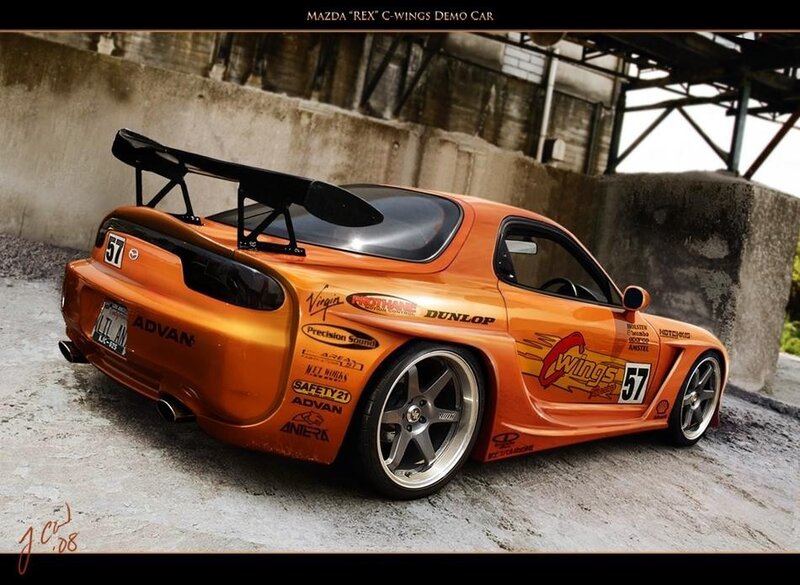 Orange Race Car — Dramatic, Photograph, Race Car, Tire, Wing