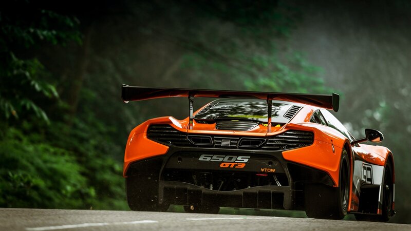 Orange Race Car — Dramatic, Photograph, Road