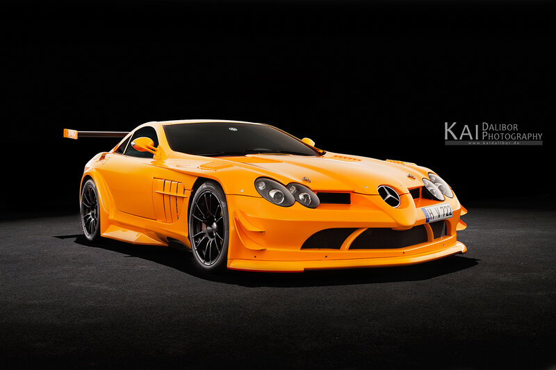 Orange Race Car — Dramatic, Photograph, Tire