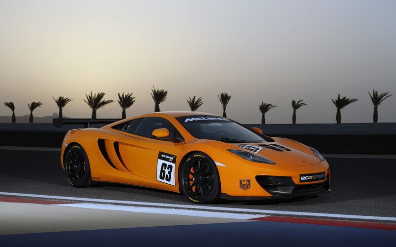 Orange Race Car — Dramatic, Sunset, Photograph, Palm Trees