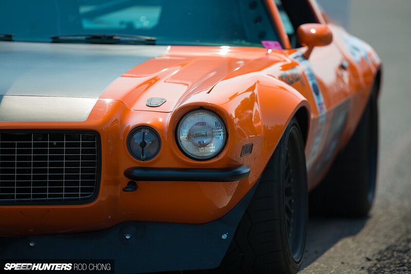 Orange Race Car — Dynamic, Afternoon, Photograph, Headlight