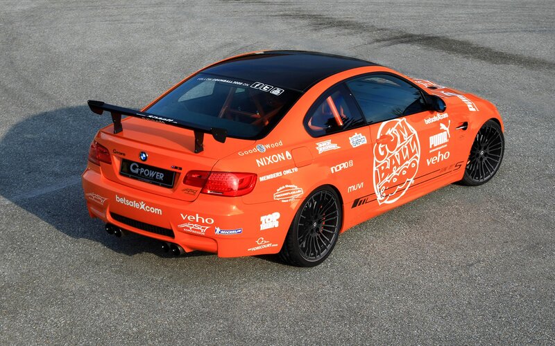 Orange Race Car — Dynamic, Afternoon, Photograph, Race Car, Sponsor Logos