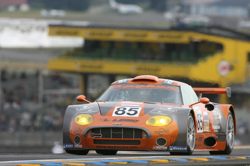 Orange Race Car — Dynamic, Afternoon, Photograph, Race Track, Spectators