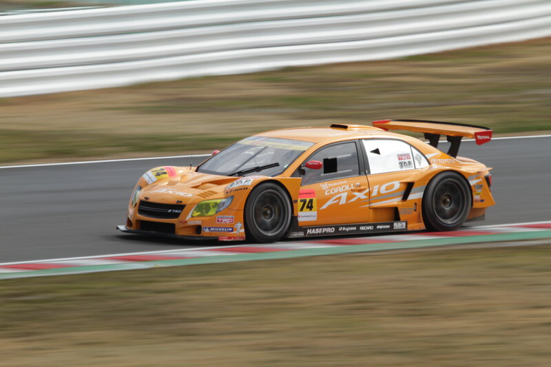 Orange Race Car — Dynamic, Photograph, Race Track, Tire