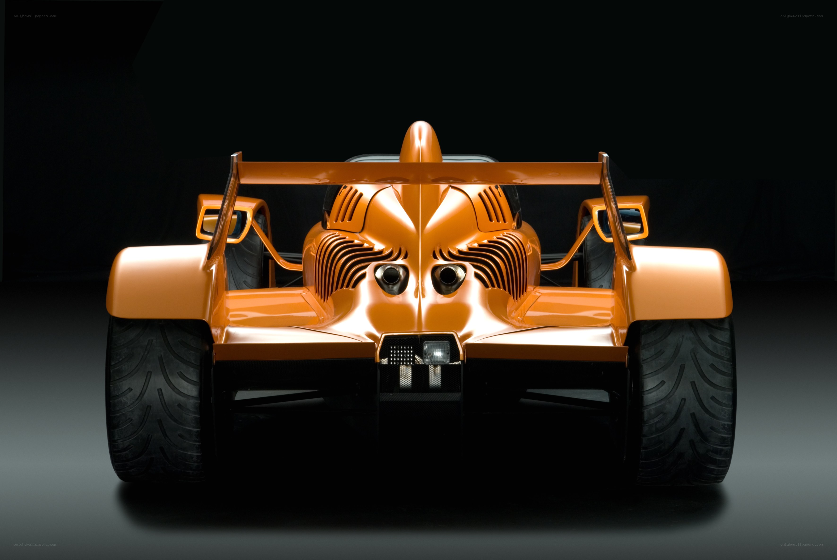 Orange race car front view