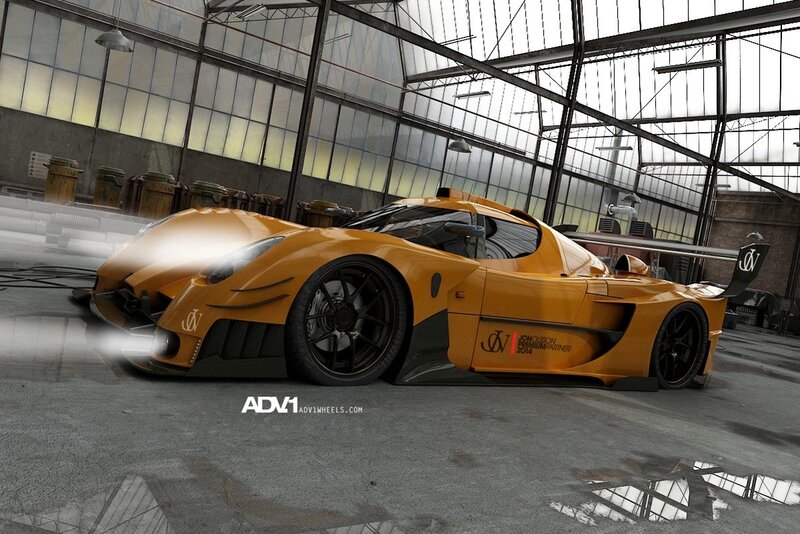 Orange race car in a hangar