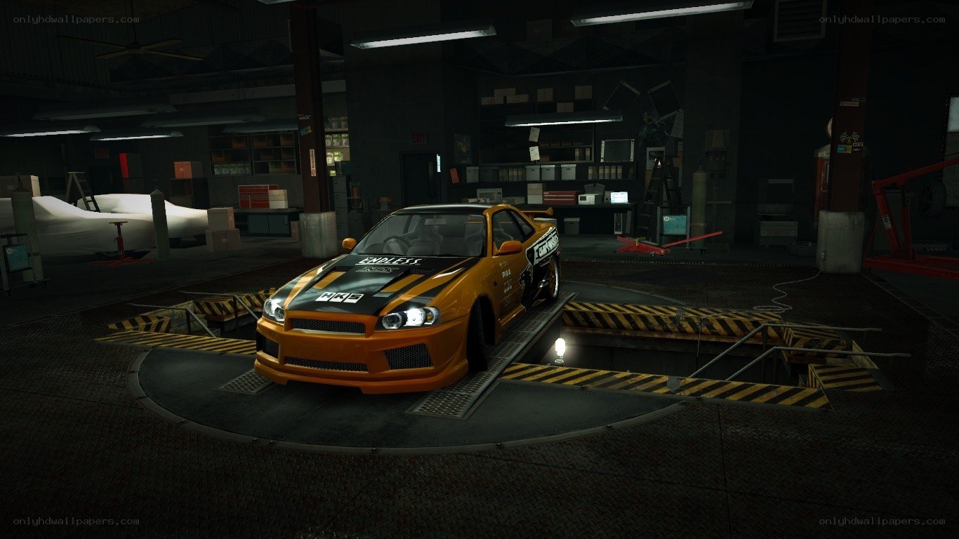 orange race car in garage