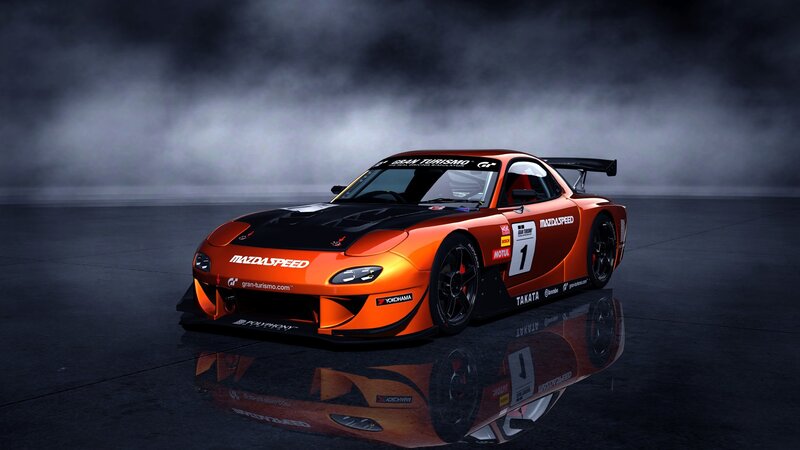 orange race car in smoke