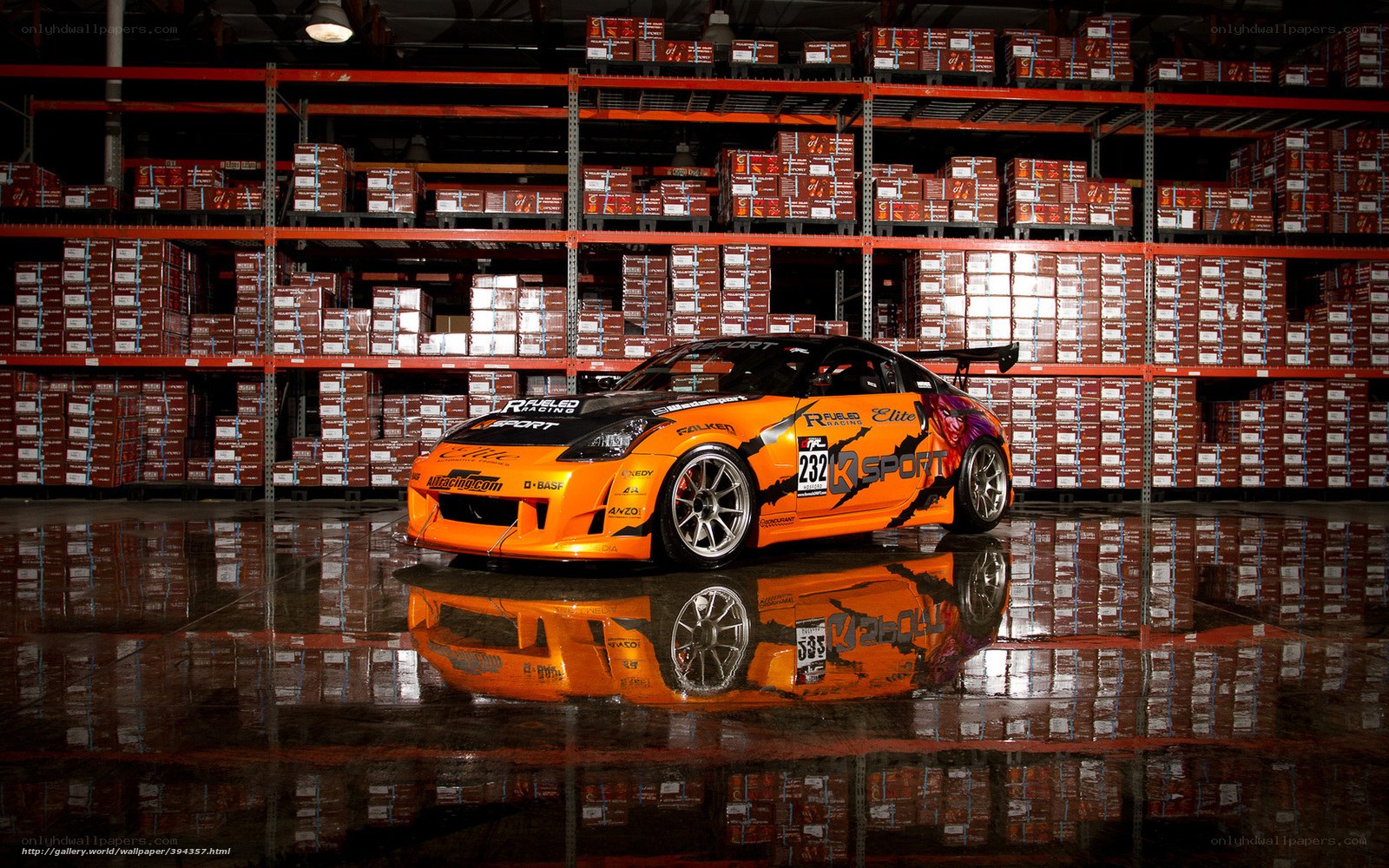 Orange race car in warehouse