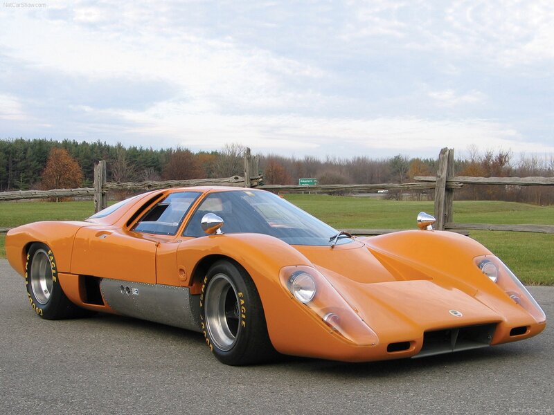 Orange race car on asphalt