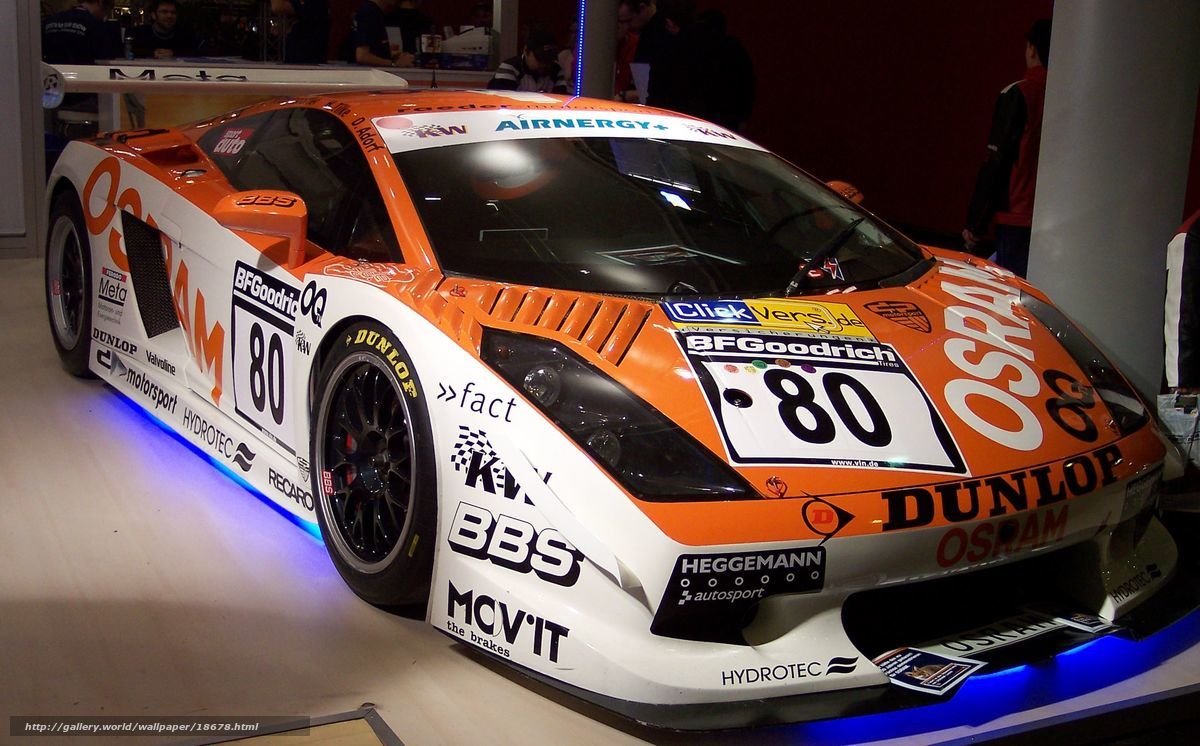 Orange race car on display