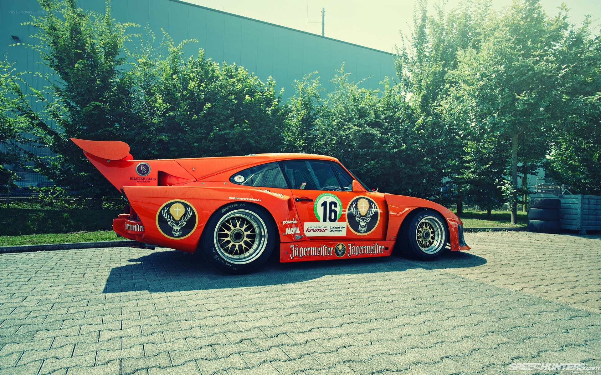 orange race car on pavement