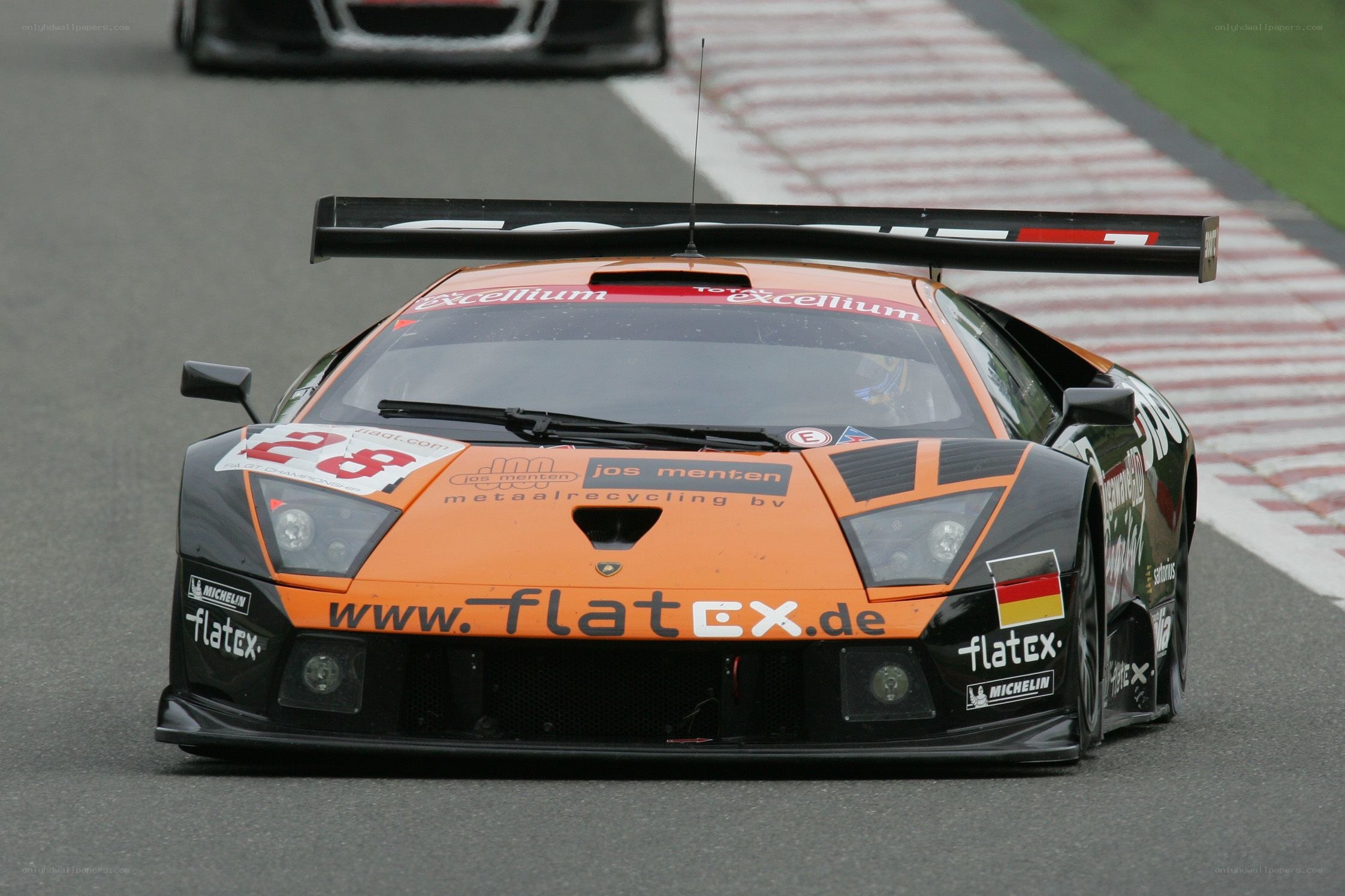 Orange race car on track