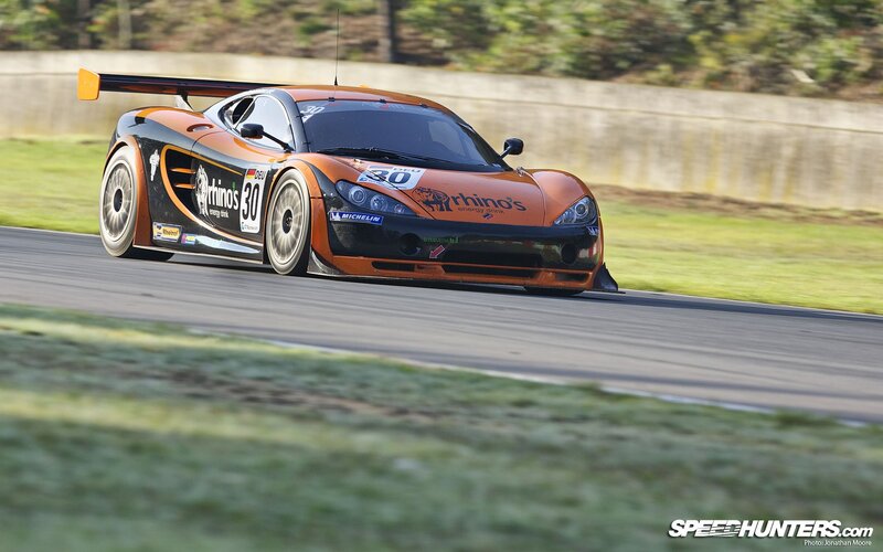 orange race car on track