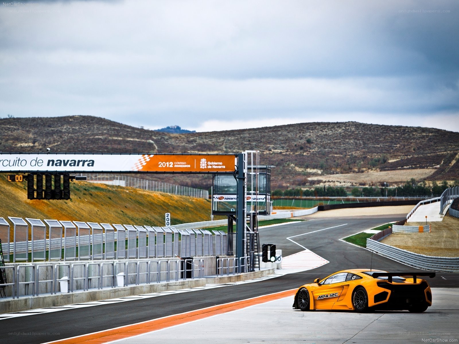 Orange race car on track