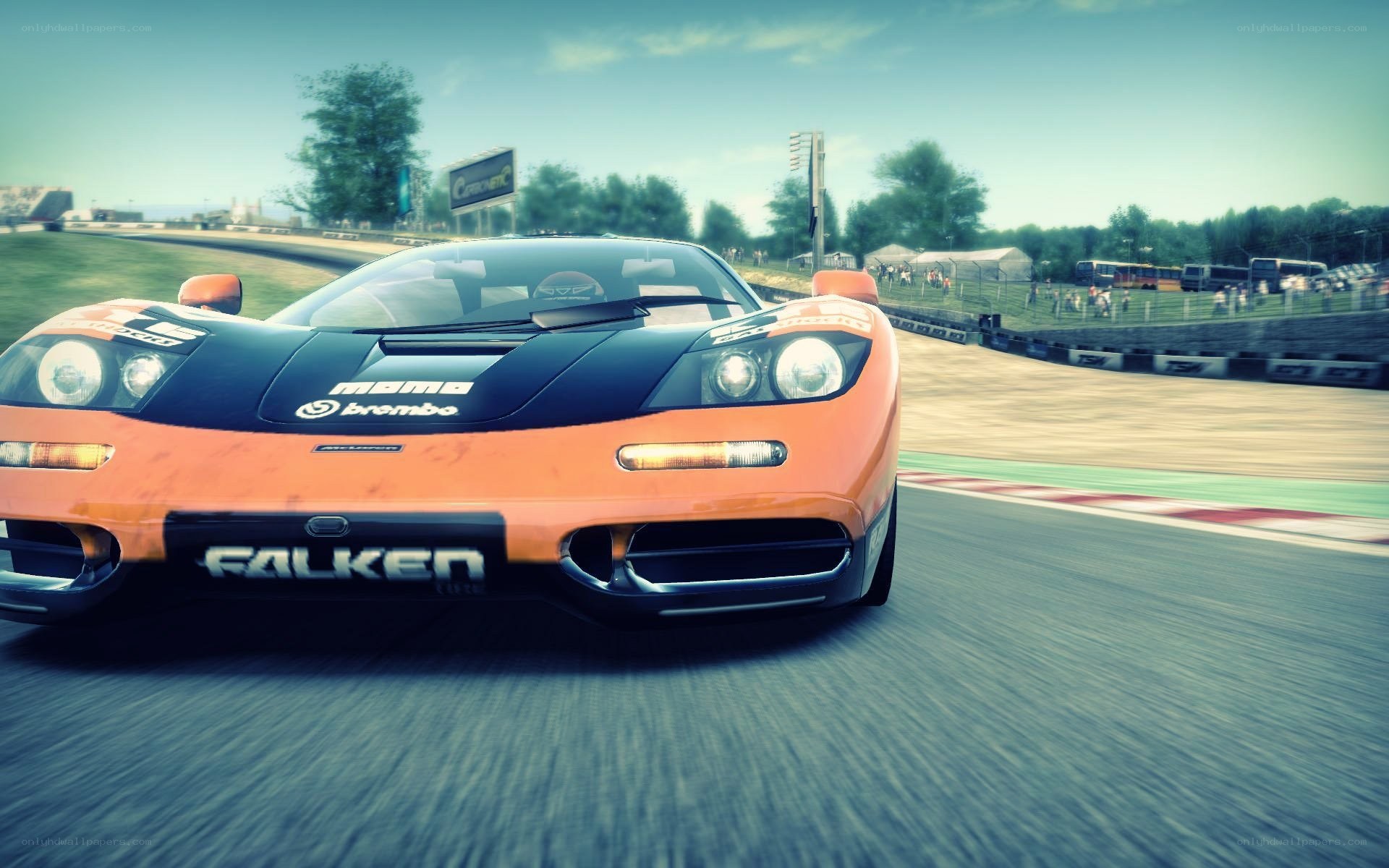 orange race car on track