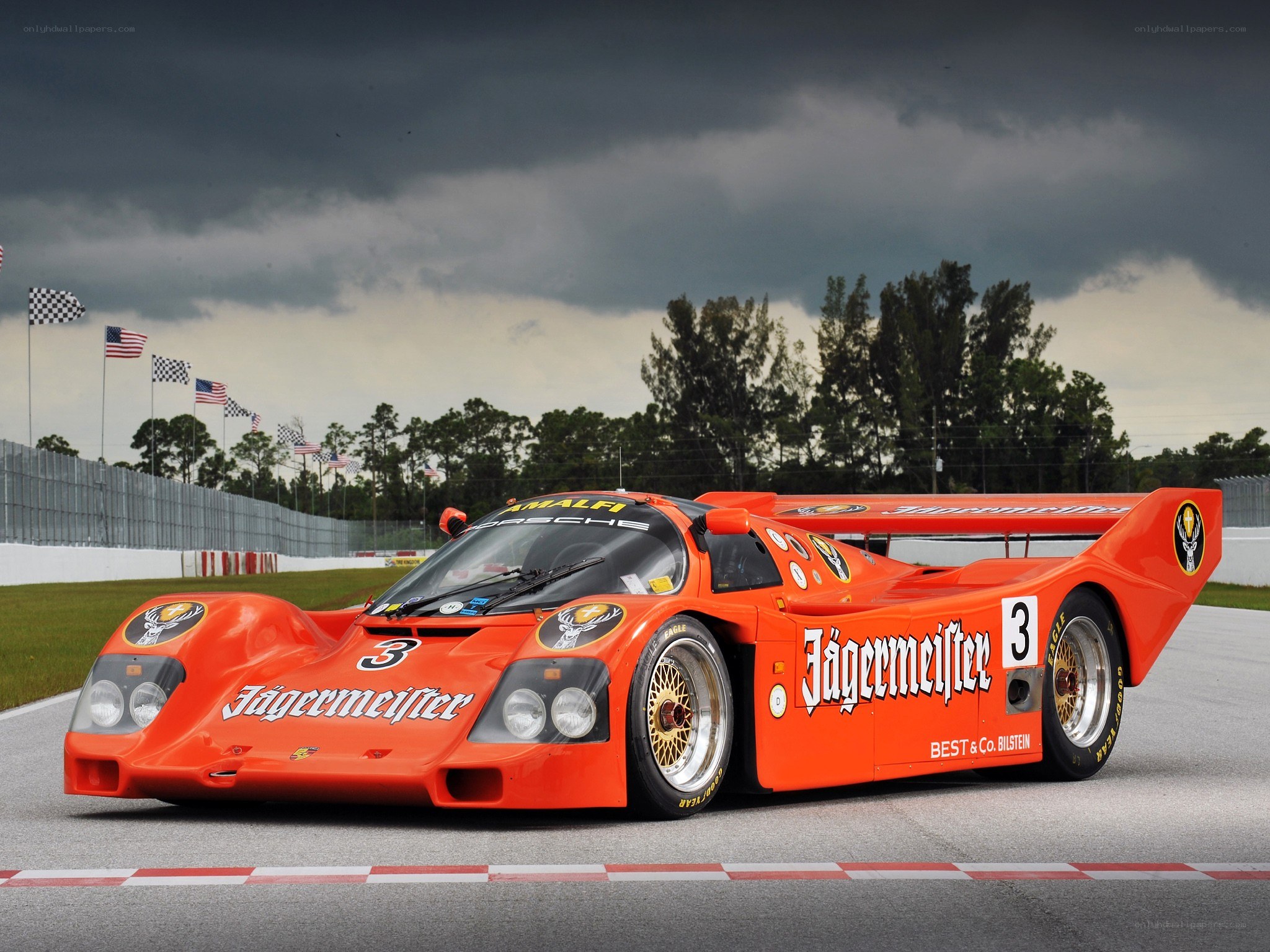 Orange race car on track