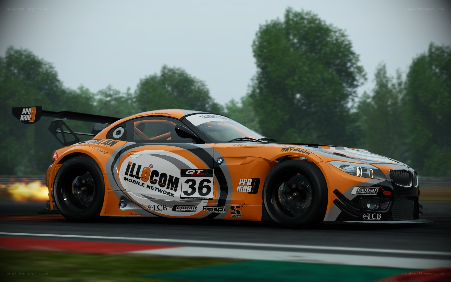orange race car on track