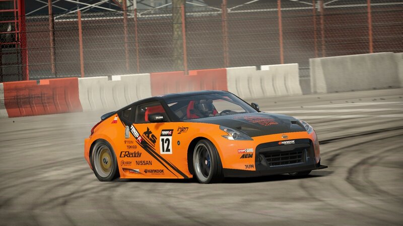 orange race car on track