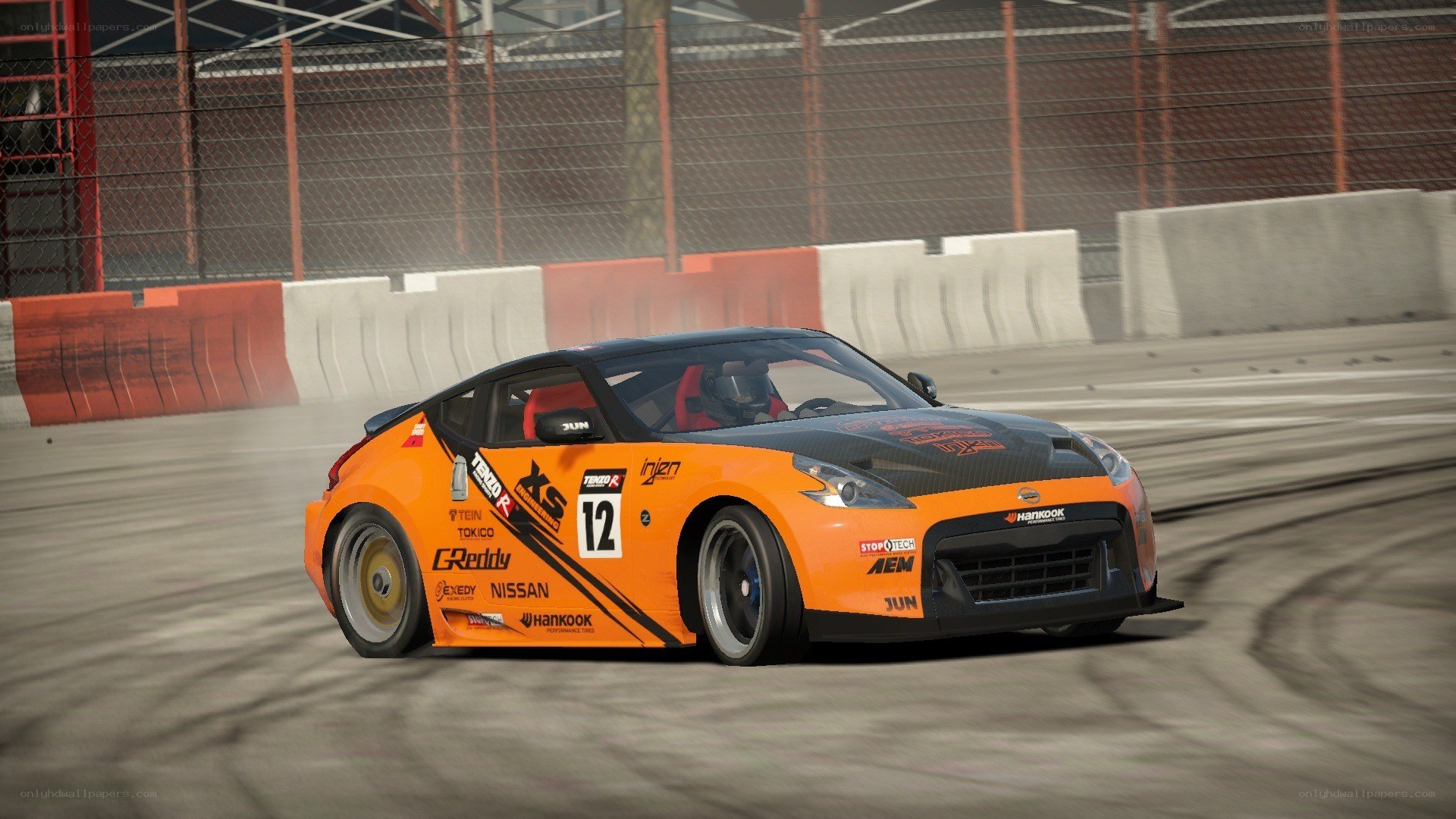orange race car on track