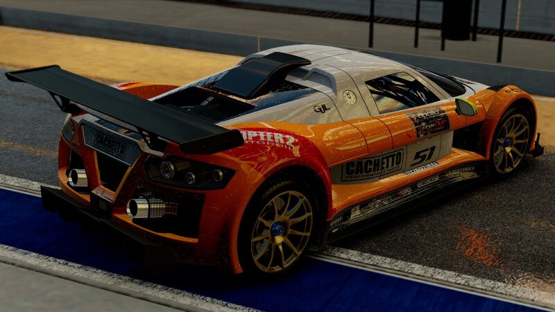 orange race car on track