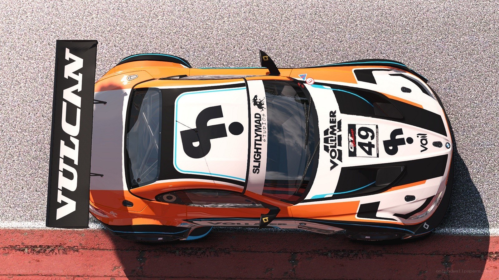orange race car on track