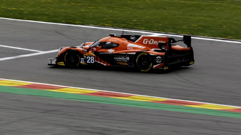 Orange Race Car on Track — Dynamic, Photograph