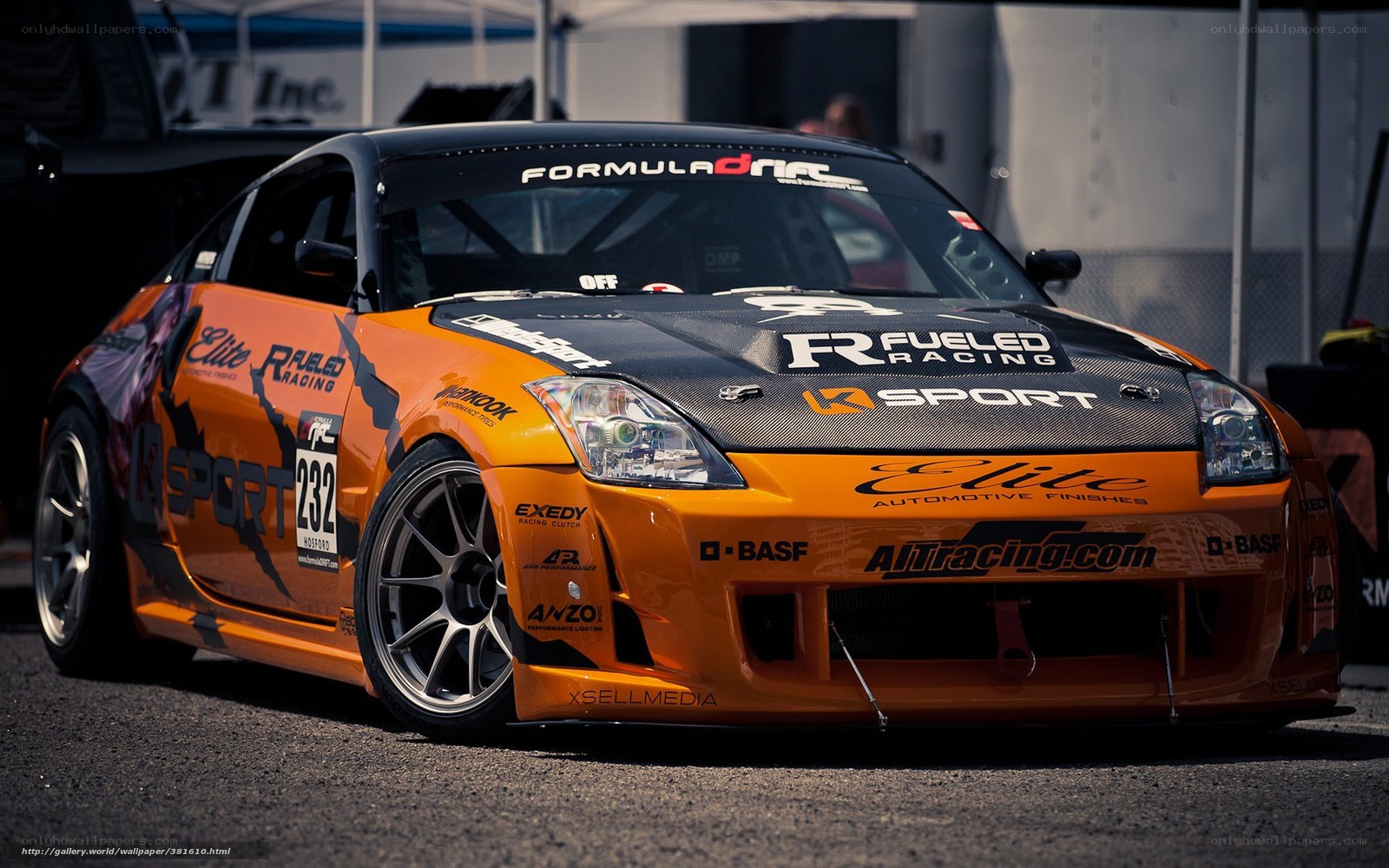 orange race car with decals